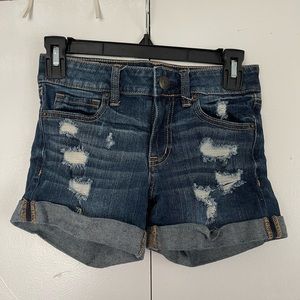 Aero Low Rise Midi Ripped Denim Shorts